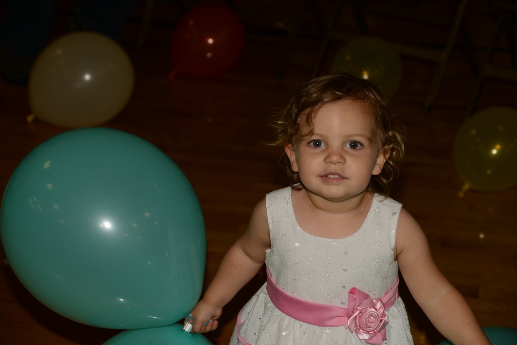 Greta playing with the balloons at Caleb s reception2